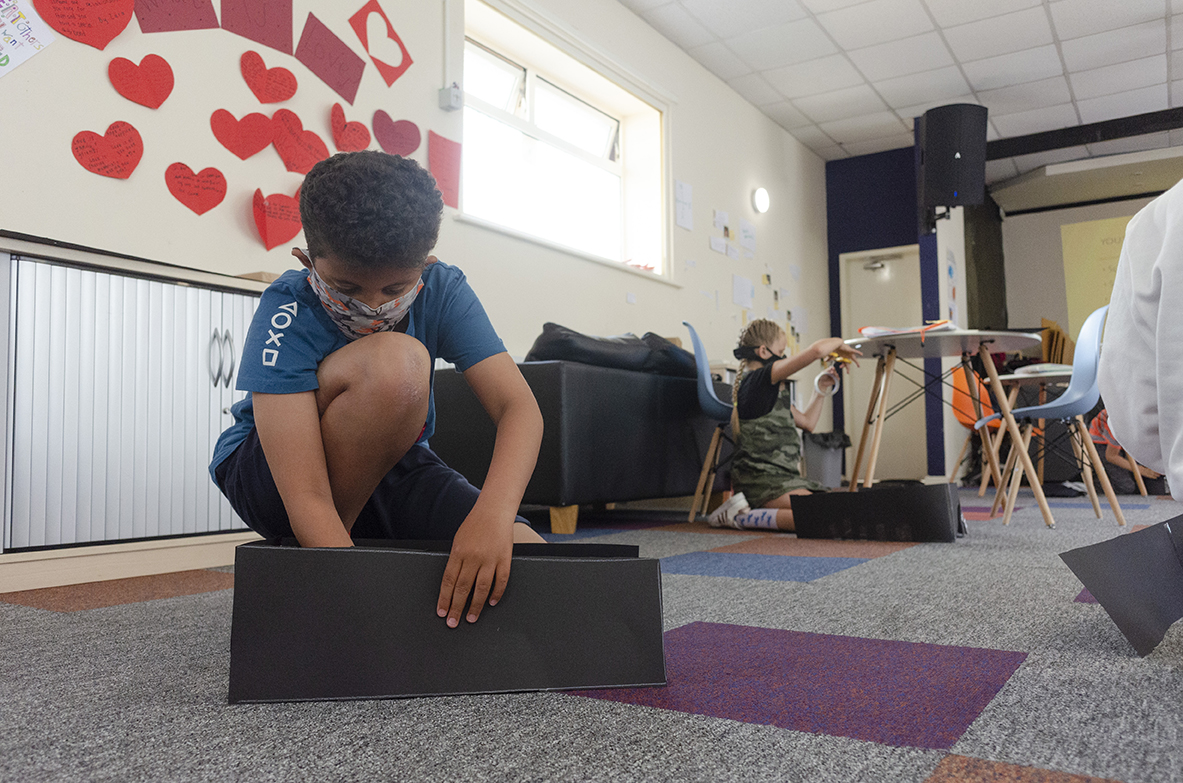 Young Bubble Up participants in Claremont make a camera obscura during summer 2020