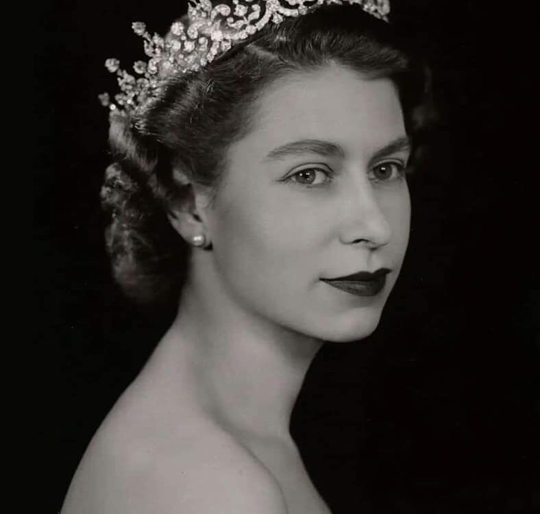 Black and white image of Queen Elizabeth II as a young Queen.
