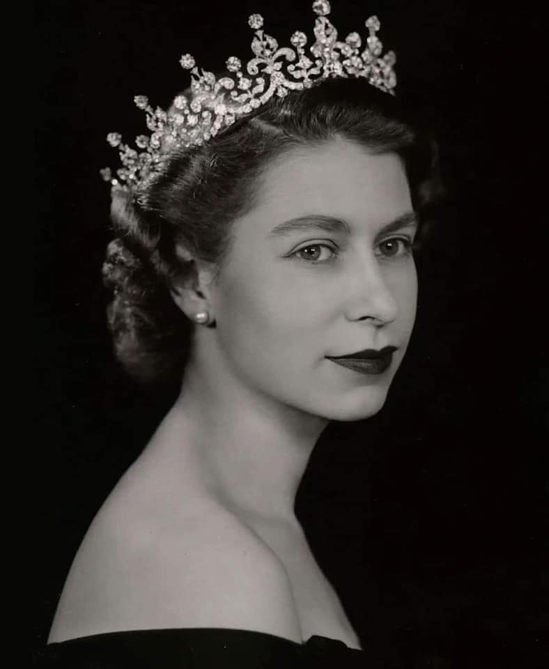 Black and white image of Queen Elizabeth II as a young Queen.