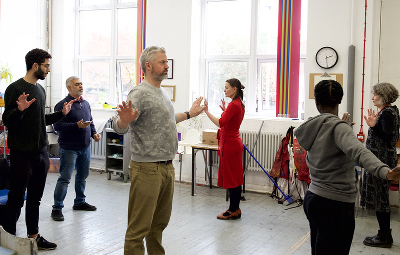 A diverse group of artists participate in an Artsist Practise Day as part of the Pushing Boundaries programme.