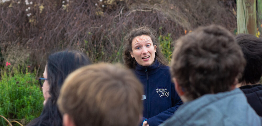 An employee of Chester Zoo speaks to a group of young people at the Zoo.